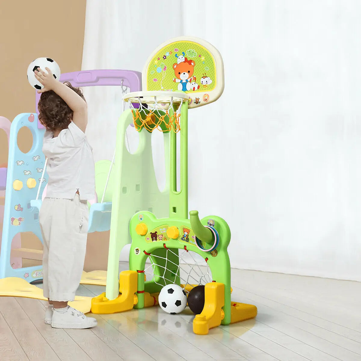 A 6-in-1 Toddler Swing Set, Basketball Hoop, and Football Gate Set childrensterritory