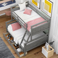 A Twin Over Bunk Bed Featuring Storage Drawers and Ladders childrensterritory